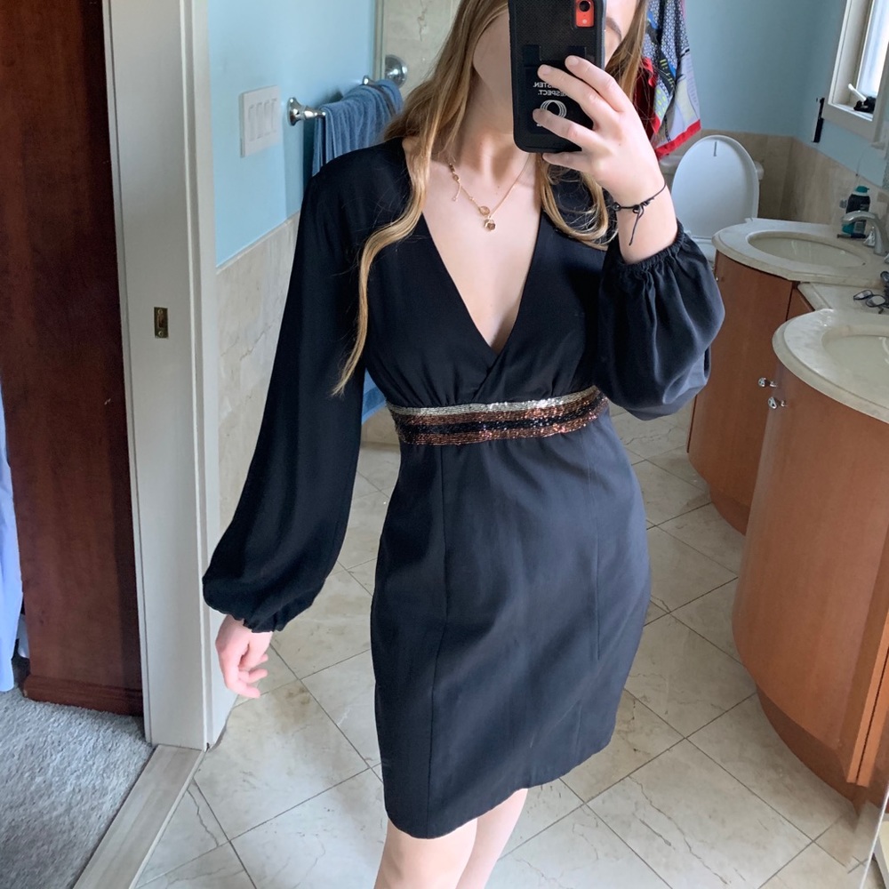 Black mini- dress with sparkly waist